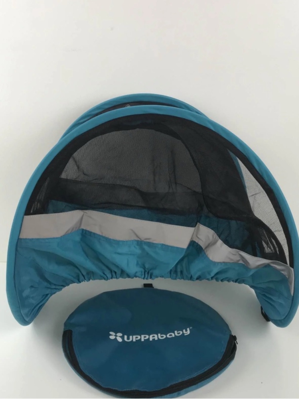 UPPAbaby Cabana Infant Car Seat Shade with a mesh cover and matching storage